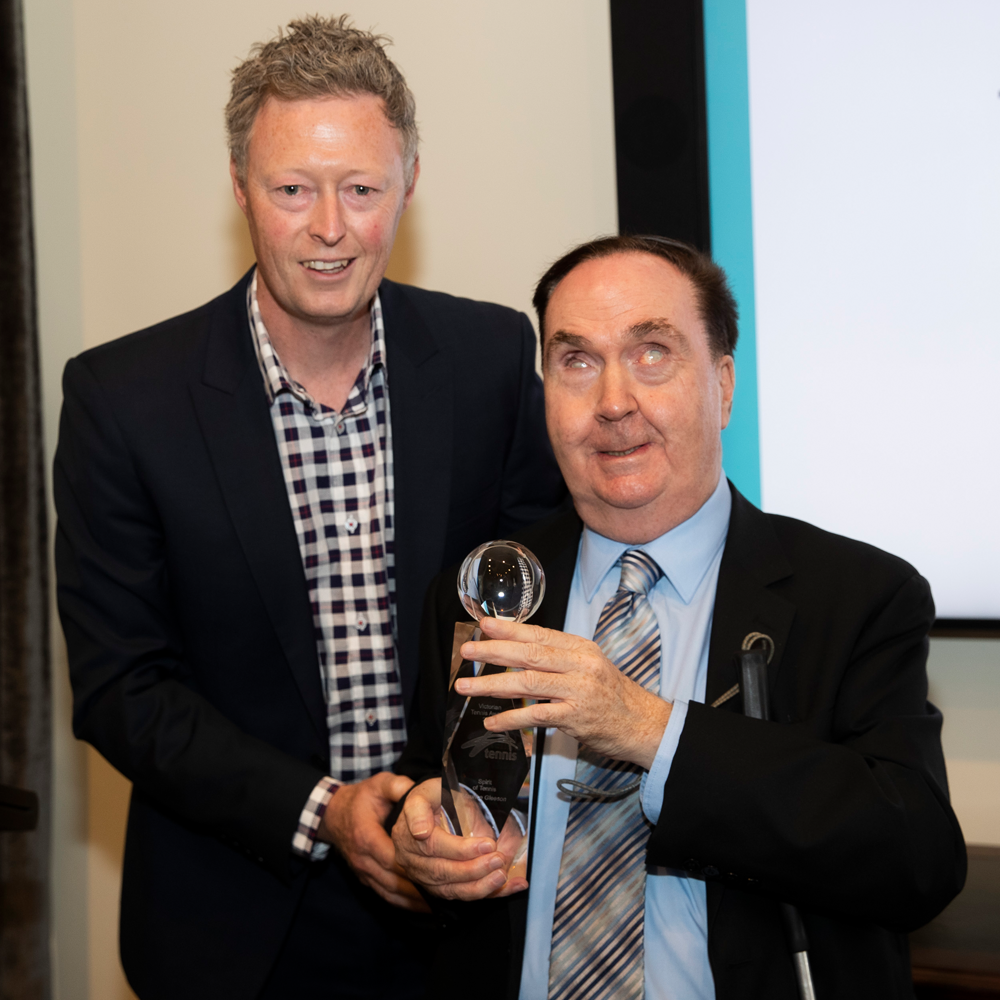 Adam Crameri presenting the Spirit of Tennis Award to Maurice Gleeson OAM
